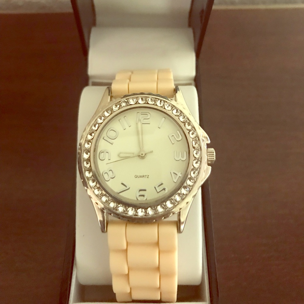 Silver and crystal watch with silicone band.